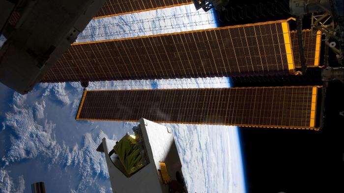 Photo of The HICO and RAIDS Experiment Payload orbiting Earth (Image courtesy of NASA)