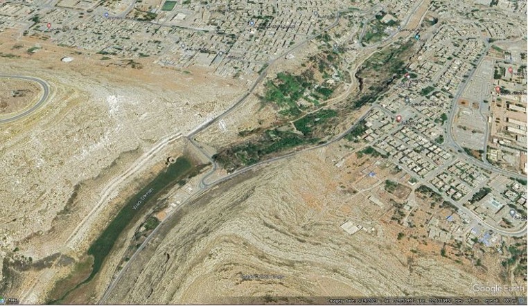 Figure 12: The lower dam was in extreme proximity to the city, contributing to the damage that ensued (Image © 2023 Google Earth)