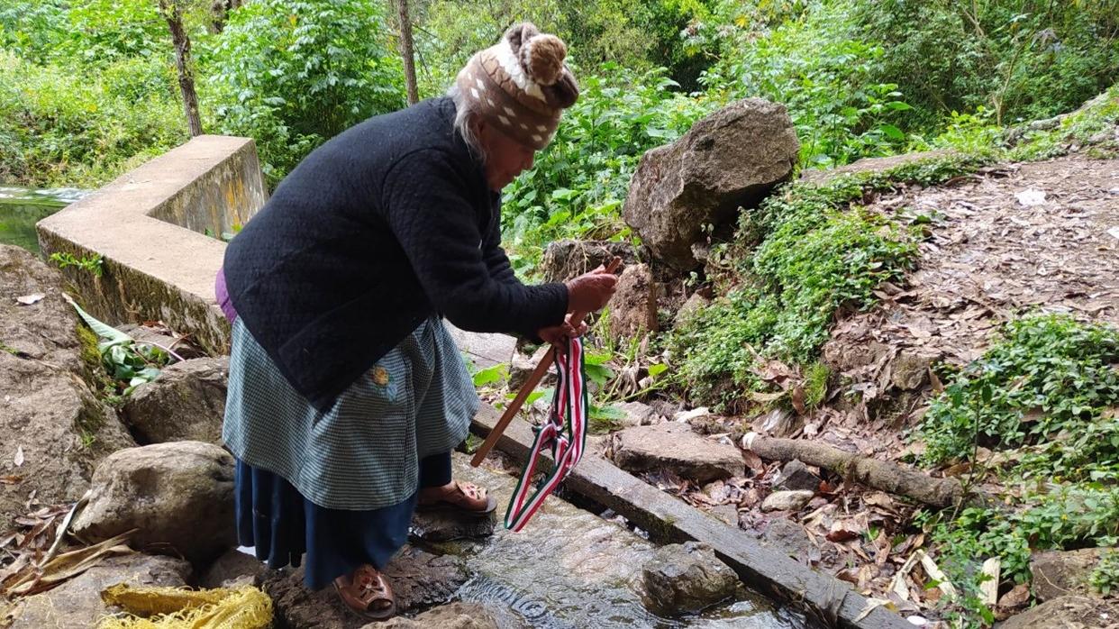 Tääk ë´mëj (grandmother) cleansing her wooden cane. In Tamazulápam women guide the spiritual life of people in the community and teach younger generations the rituals and forms to interact with nature.   Photo credits: Joselí Martínez-Vidal, Young Ëyuujk man from Tamazulápam del Espíritu Santo, Mixe, Oaxaca.